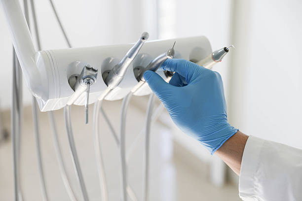 Professional Emergency Dentist technician working in Cumings, TX